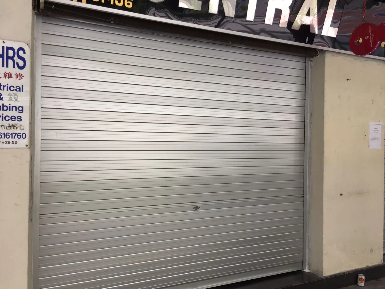 Aluminium roller shutter closing a shopfront