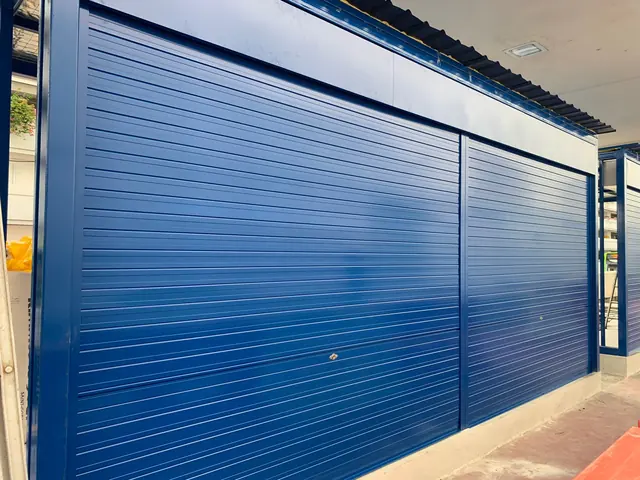 Blue powder-coated aluminium shutters