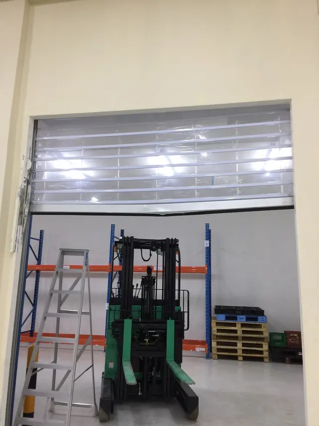 Polycarbonate roller shutter in a warehouse
