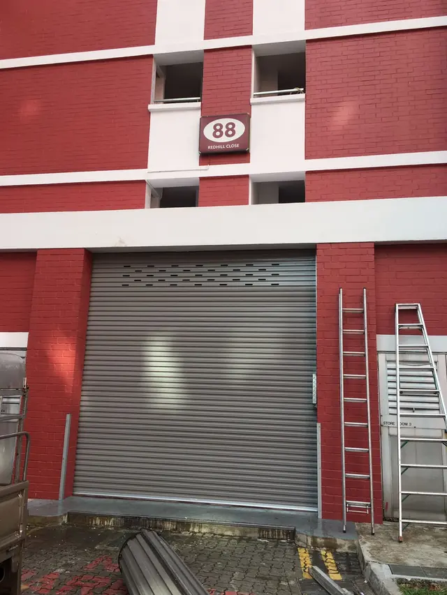 Roller door being installed at a residential block
