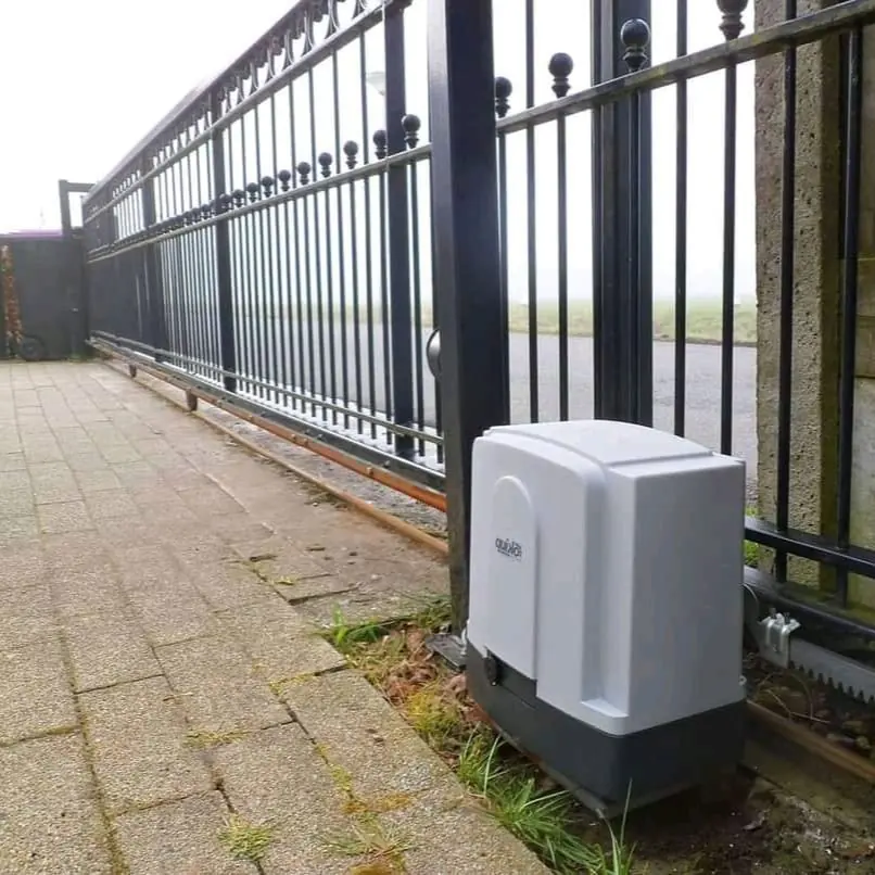 QUIKO sliding gate operator installed on a residential gate